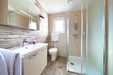 Two-Bedroom Apartment in Malinska for 5 Guests