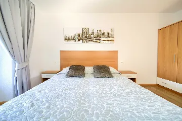 Two-Bedroom Apartment in Malinska for 5 Guests