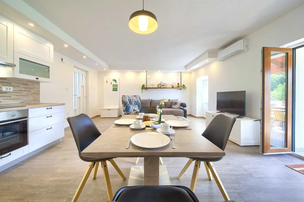 Two-Bedroom Apartment in Malinska for 5 Guests