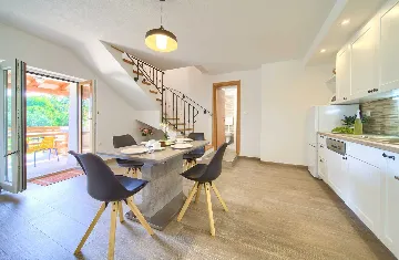 Two-Bedroom Apartment in Malinska for 5 Guests