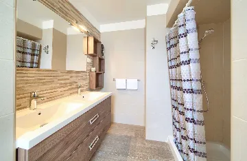 Two-Bedroom Apartment in Malinska for 5 Guests