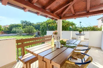 Two-Bedroom Apartment in Malinska for 5 Guests