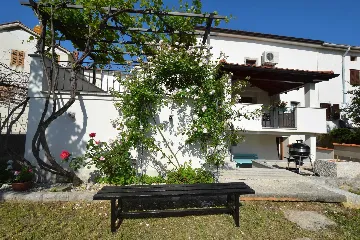 Two-Bedroom Apartment in Malinska for 5 Guests