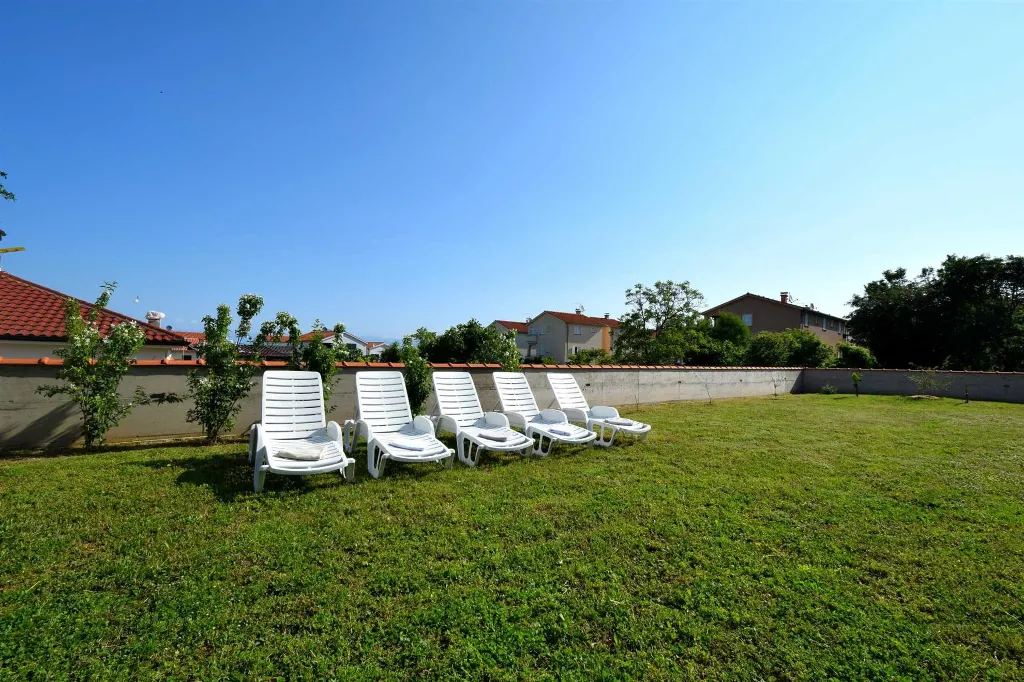 Two-Bedroom Apartment in Malinska for 5 Guests