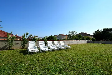 Two-Bedroom Apartment in Malinska for 5 Guests