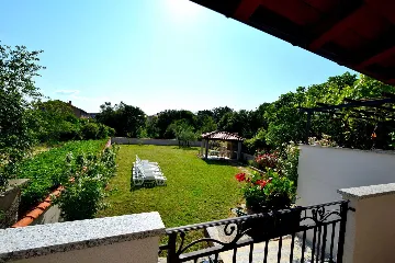 Two-Bedroom Apartment in Malinska for 5 Guests