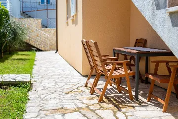 Two-Bedroom Apartment in Malinska for 4 Guests