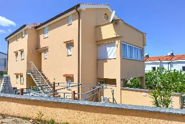 Two-Bedroom Apartment in Malinska for 4 Guests