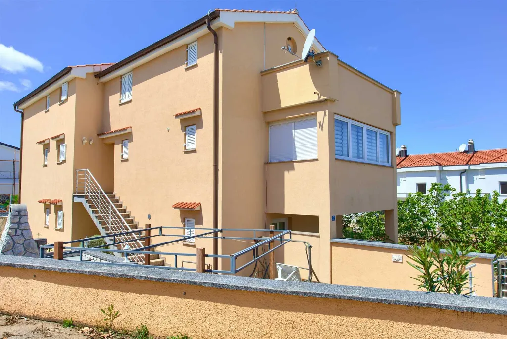 Two-Bedroom Apartment in Malinska for 4 Guests