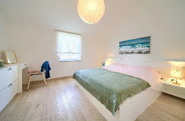 Two-Bedroom Apartment in Malinska for 4 Guests