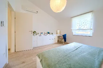 Two-Bedroom Apartment in Malinska for 4 Guests