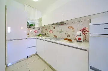 Two-Bedroom Apartment in Malinska for 4 Guests