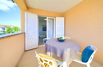 Two-Bedroom Apartment in Malinska for 4 Guests