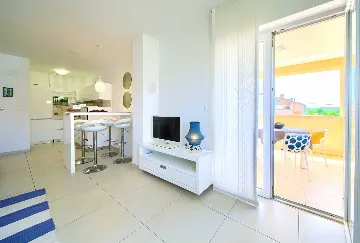 Two-Bedroom Apartment in Malinska for 4 Guests