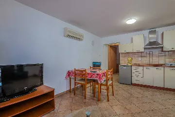 Ground-Floor Apartment with Terrace in Njivice