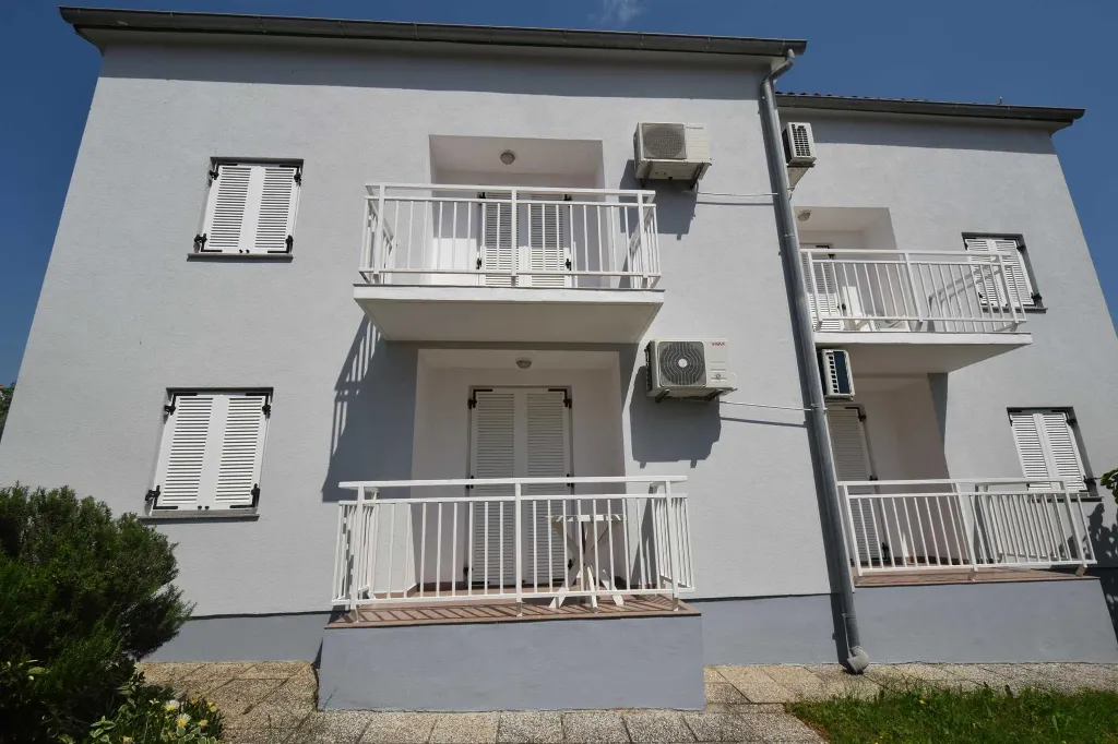Njivice Apartment with Balcony for 4 Guests