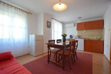 Njivice Apartment with Balcony for 4 Guests