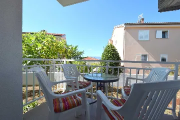 Njivice Apartment with Balcony for 4 Guests