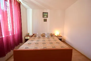 Njivice Apartment with Balcony for 4 Guests