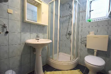 Njivice Apartment with Balcony for 4 Guests