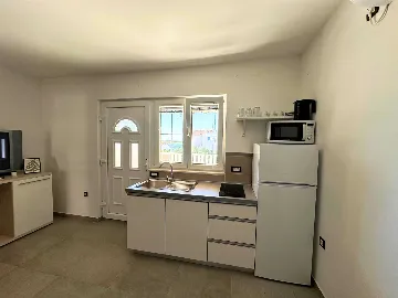 Two-Bedroom Apartment with Terrace in Novalja