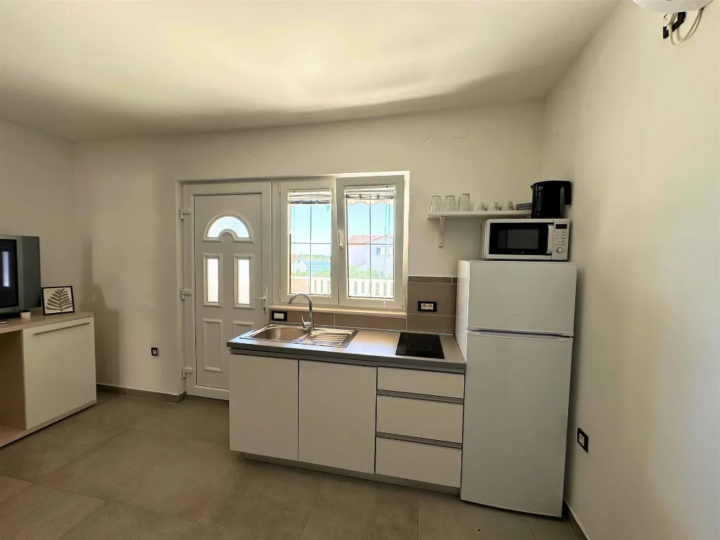 Two-Bedroom Apartment with Terrace in Novalja