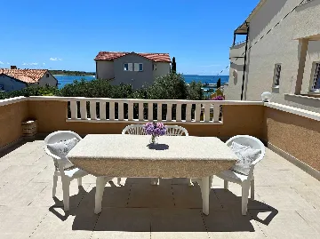 Two-Bedroom Apartment with Terrace in Novalja