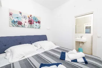 Two-Bedroom Apartment in Jelsa for 4 Guests