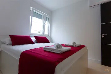 Novalja Two-Bedroom Apartment with Balcony