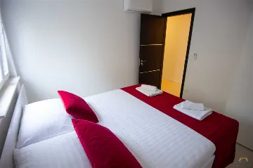 Novalja Two-Bedroom Apartment with Balcony