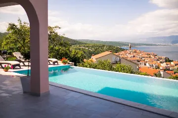 Apartment in Vrbnik with Private Infinity Pool