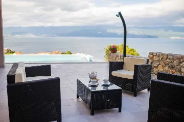 Apartment in Vrbnik with Private Infinity Pool