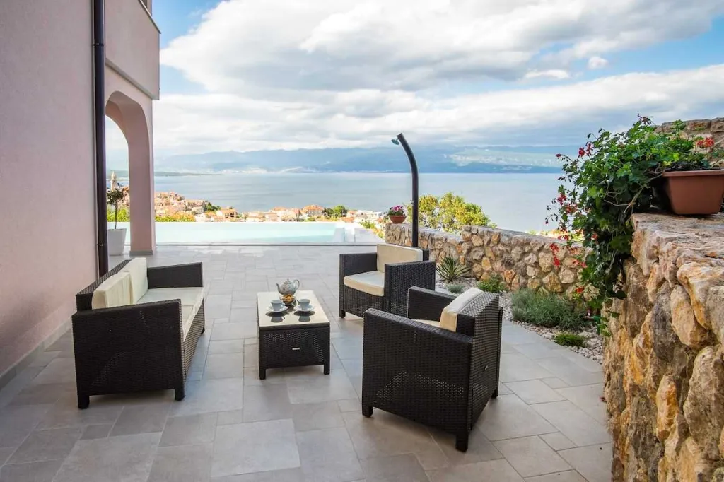 Apartment in Vrbnik with Private Infinity Pool