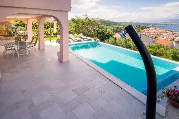 Apartment in Vrbnik with Private Infinity Pool