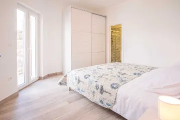 Apartment in Vrbnik with Private Infinity Pool