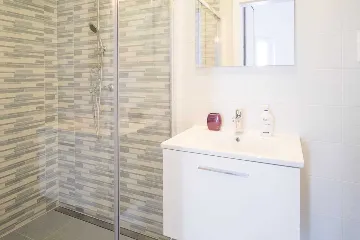 Apartment in Vrbnik with Private Infinity Pool