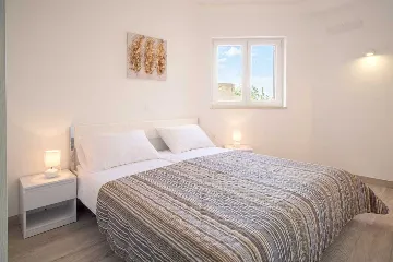 Apartment in Vrbnik with Private Infinity Pool