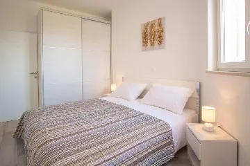 Apartment in Vrbnik with Private Infinity Pool