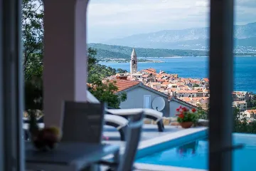 Apartment in Vrbnik with Private Infinity Pool