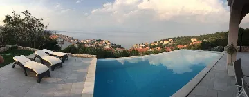 Apartment in Vrbnik with Private Infinity Pool
