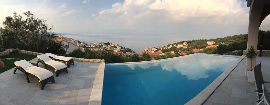 Apartment in Vrbnik with Private Infinity Pool