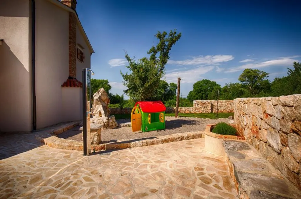 Dobrinj Villa with Private Pool and Garden Playground