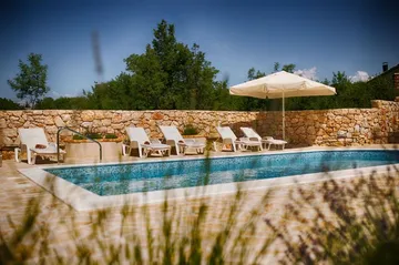 Dobrinj Villa with Private Pool and Garden Playground