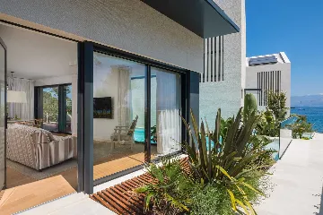 Beachfront Villa Retreat in Sutivan with Pool