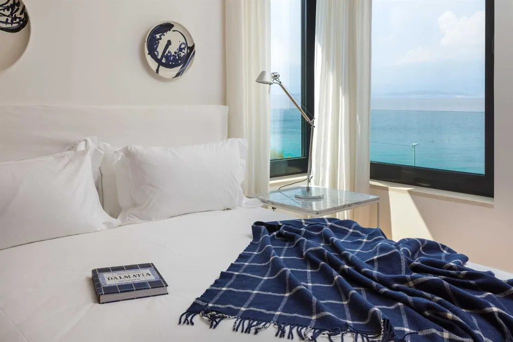 Beachfront Villa Retreat in Sutivan with Pool