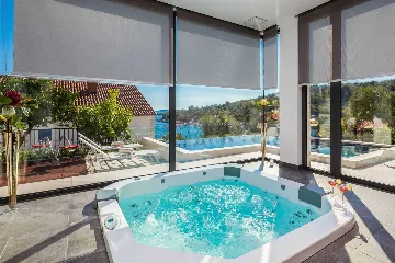 Contemporary Seafront Villa with Heated Pool in Okrug Gornji