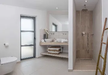 Modern 4-Bedroom Seaside Villa Žrnovo with Pool