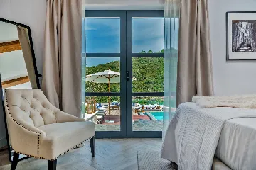 Modern 4-Bedroom Seaside Villa Žrnovo with Pool