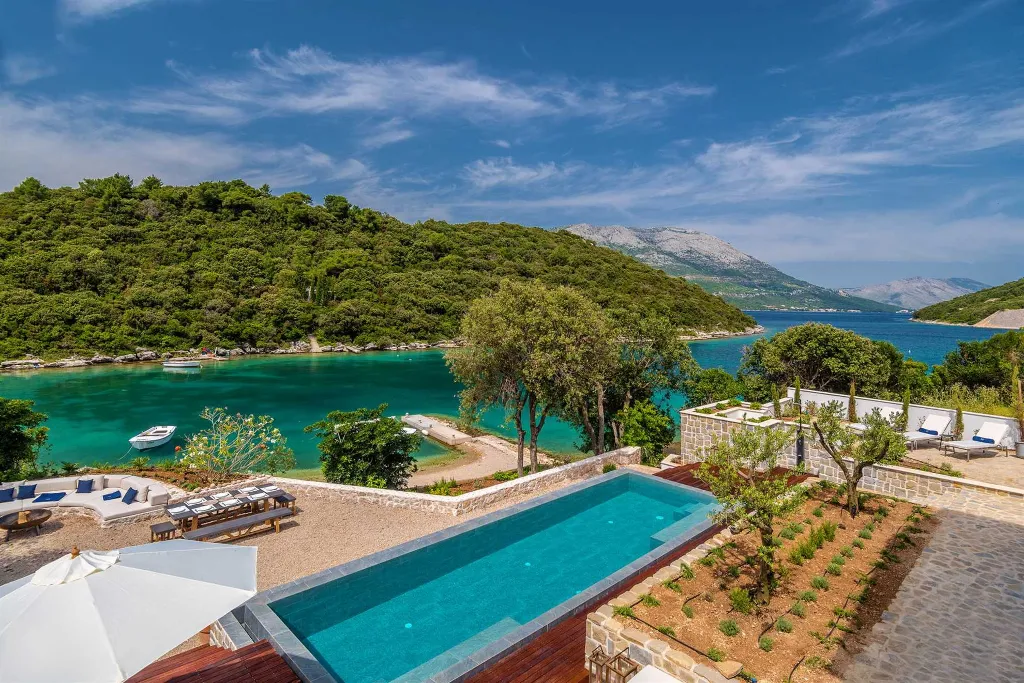 Modern 4-Bedroom Seaside Villa Žrnovo with Pool