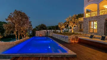 Modern 4-Bedroom Seaside Villa Žrnovo with Pool